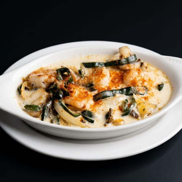 67. Queso Fundido with Shrimp.